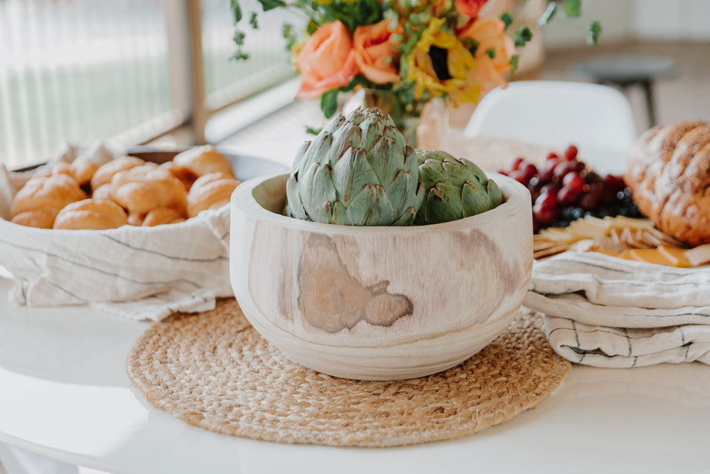 trendy neutral table setting with wooden bowl, heirloom-quality home decor and accessories, jute charger, charcuterie board | Hudson Blake lifestyle and home | shophudsonblake.com