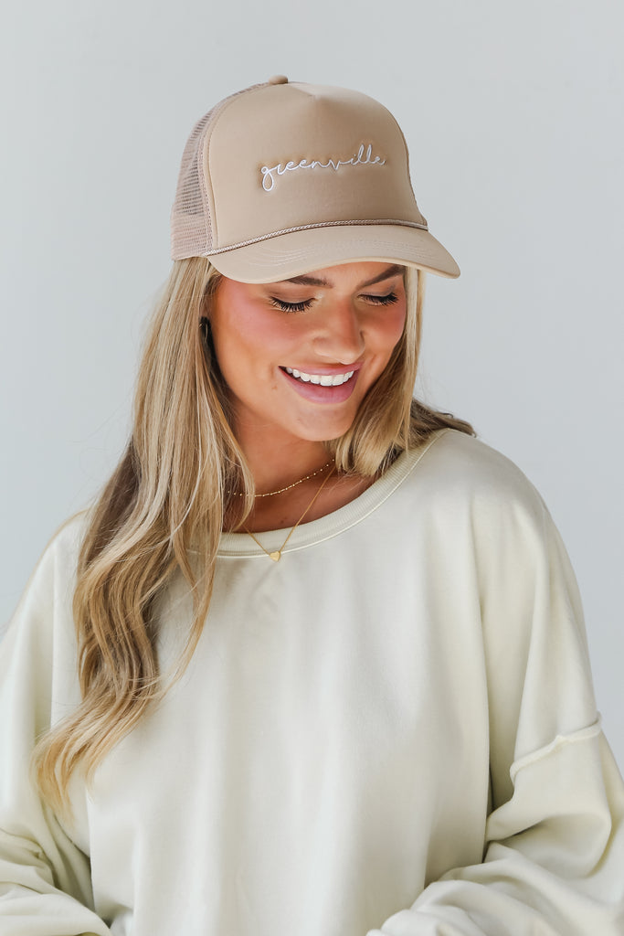 model wearing a Taupe Greenville Trucker Hat