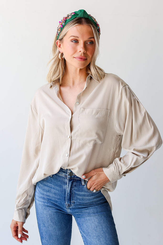 model wearing a Button-Up Blouse
