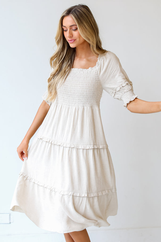model wearing a Linen Tiered Midi Dress